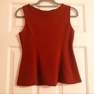 Red ribbed peplum tank top